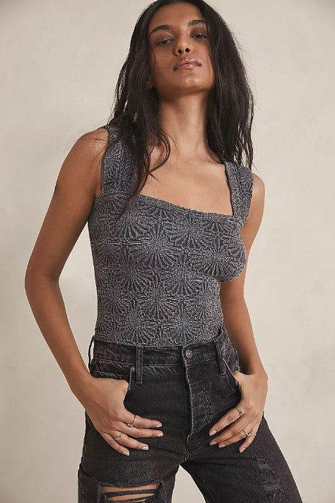 Free People Model wearing a grey textured tank top