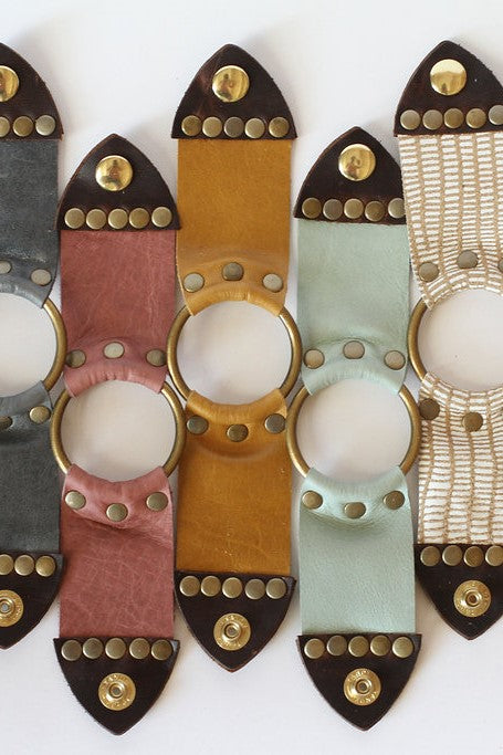 wide leather bracelets with brass ring in the middle