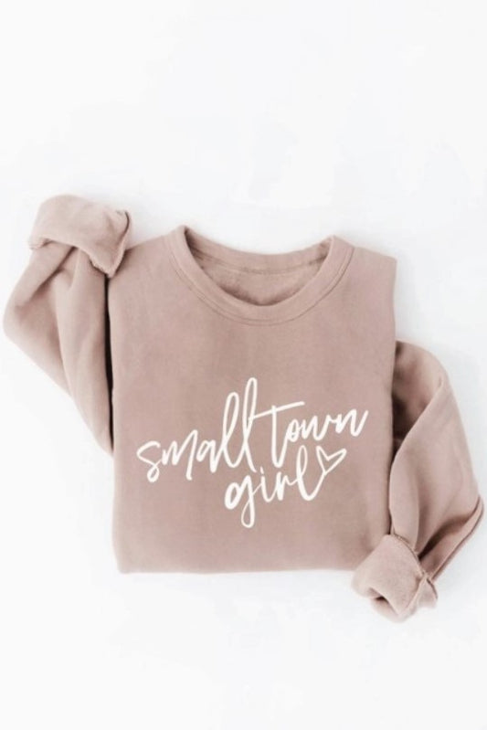 Beige sweatshirt that says "Small town girl"