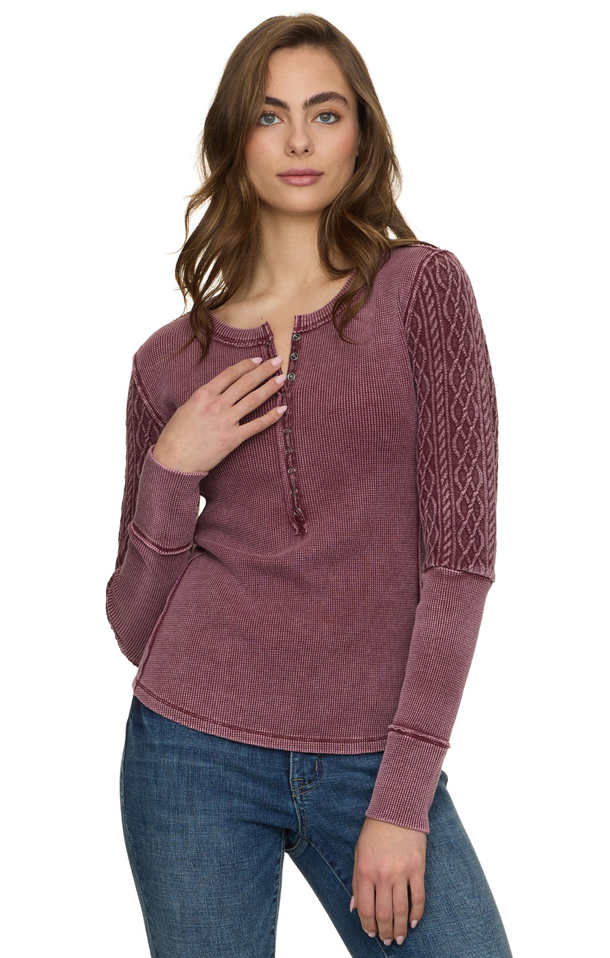 Woman wearing mixed textile henley long sleeve top